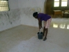Marguerite l'aide domestique en train de nettoyer